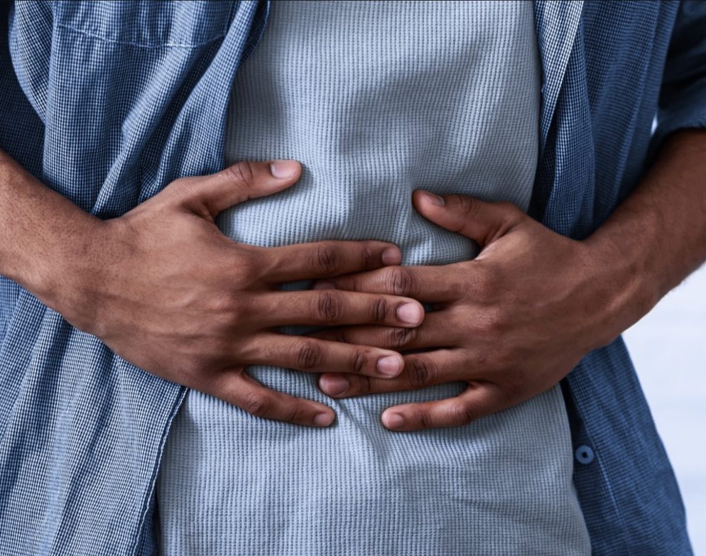 Image of a man experiencing stomach ache